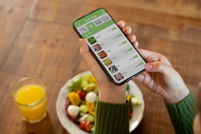 Couponing for beginners using a grocery store app on a smartphone.