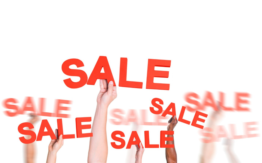 Weekend deals highlighted by bold sale signs and limited-time discounts.